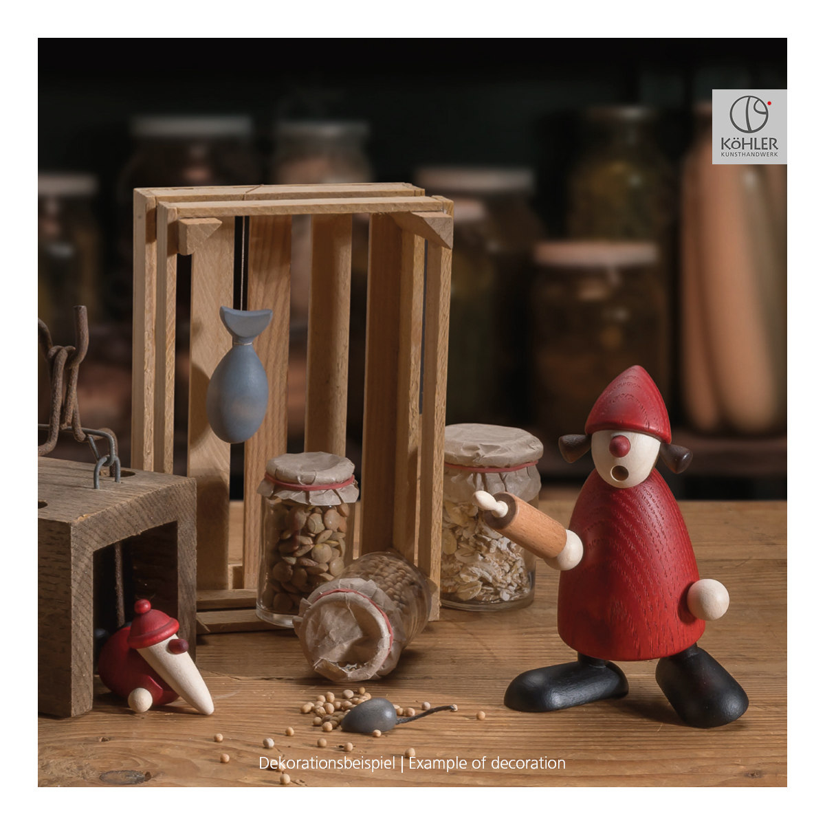 Mrs. Claus with rolling pin and mouse
