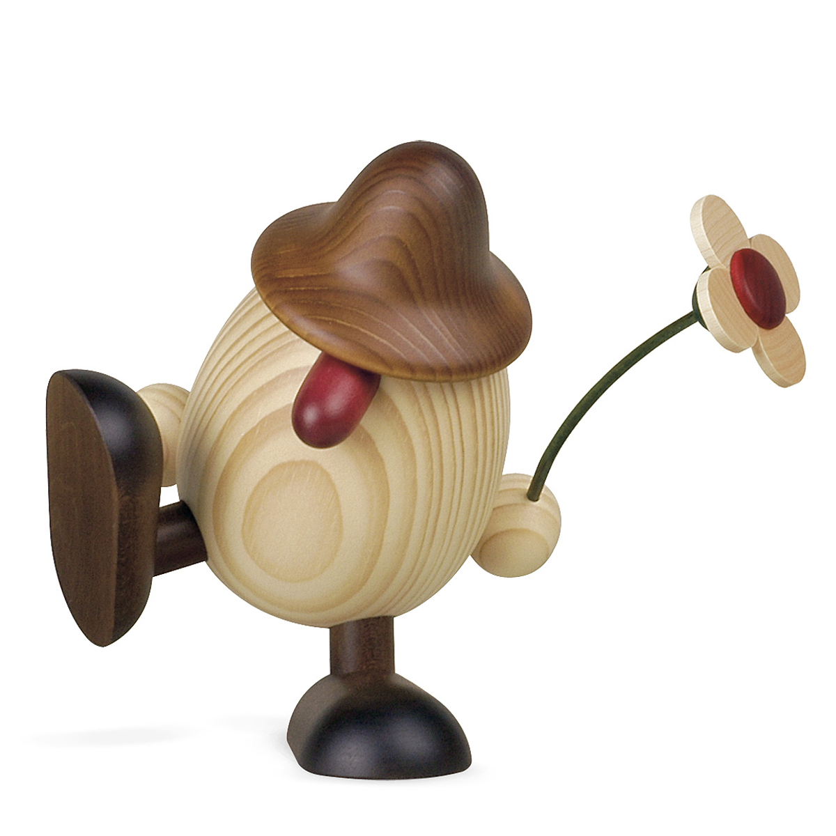 Eierkopf Vater Alfons mit Blume auf Kante sitzend/tanzend, braun