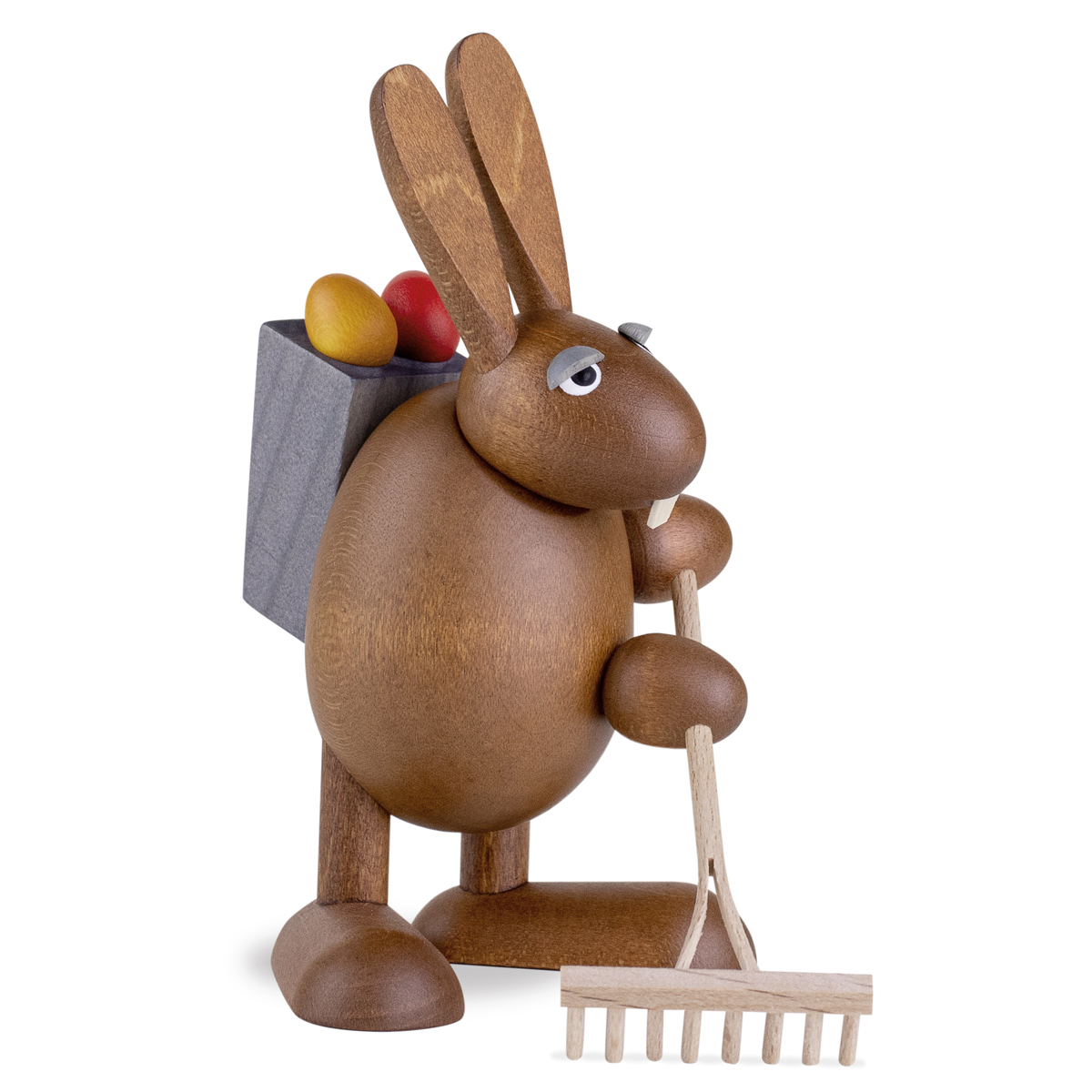Easter Bunny with garden rake an easter grass