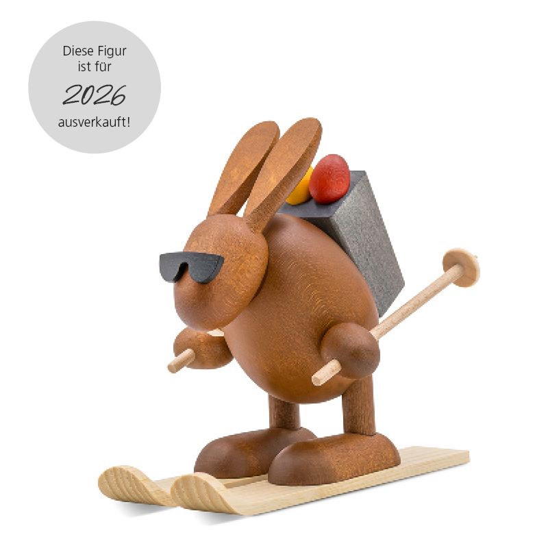 Osterhase mit Ski, fahrend
