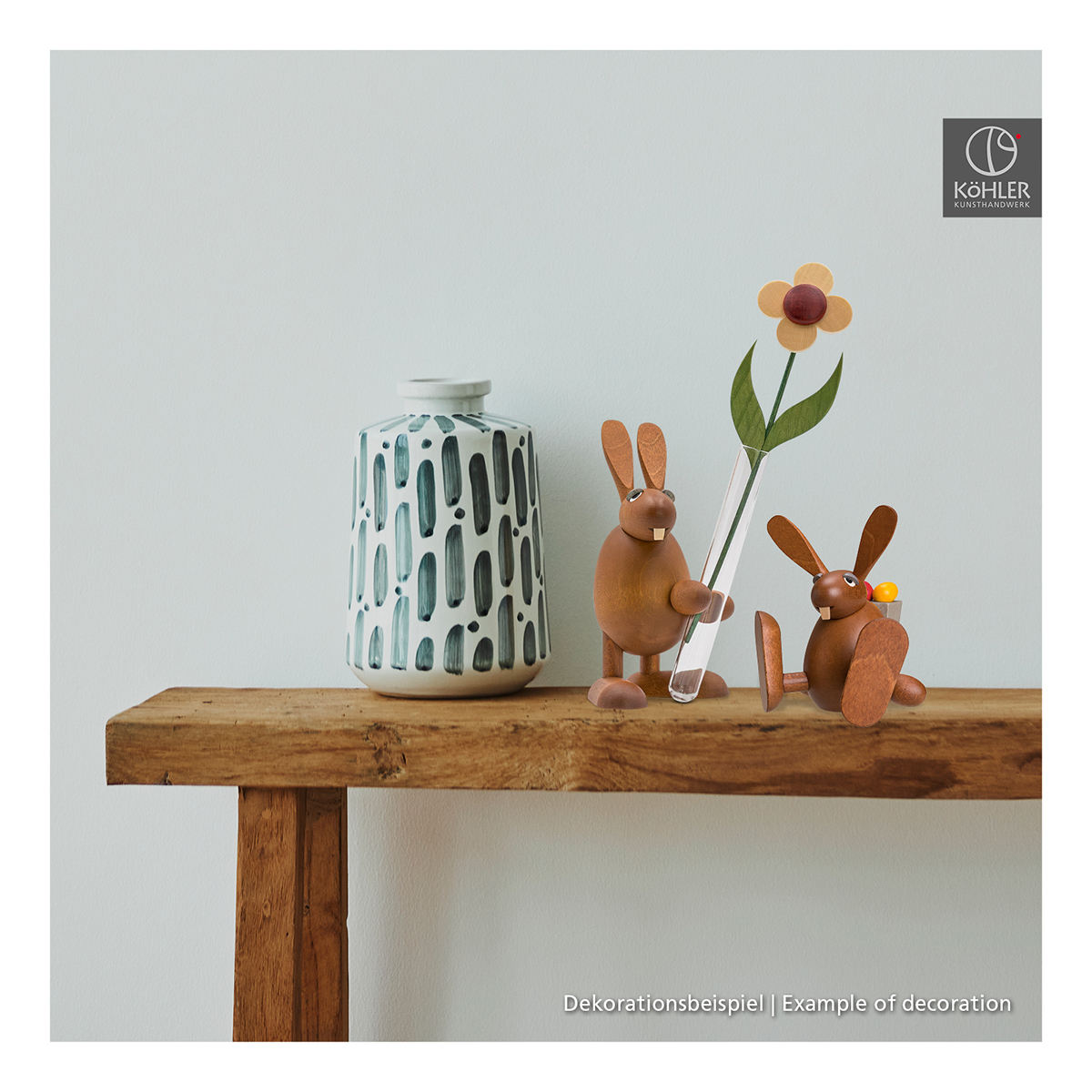 Easter bunny with flower sitting on edge / dancing