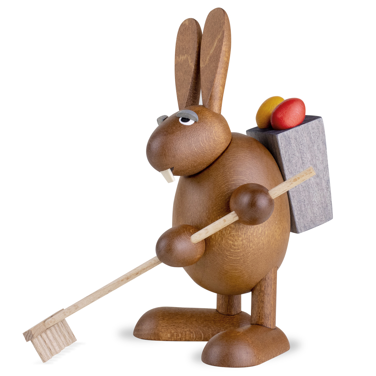 Easter Bunny with garden rake an easter grass
