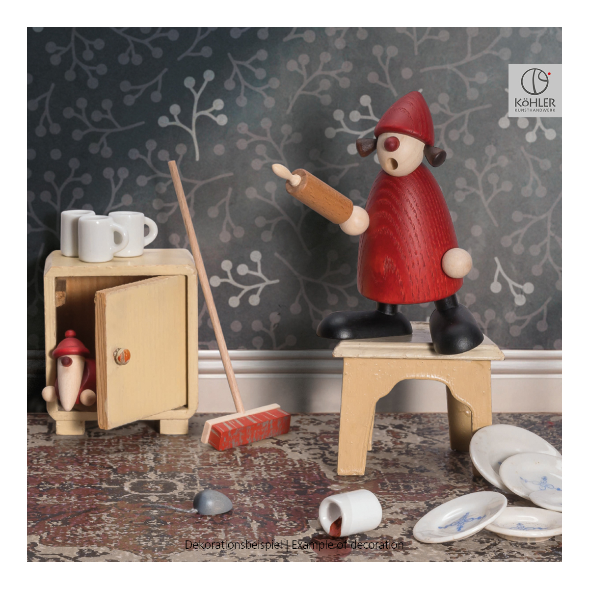 Mrs. Claus with rolling pin and mouse